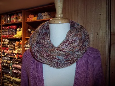 infinity scarf: a neckwarmer resembling a scarf, but forming a loop with no ends