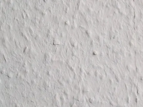 ingrain wallpaper: a type of wallpaper consisting of two layers of paper with wood fibre in between