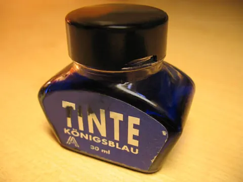 ink: a pigment (or dye)-based fluid used for writing, printing etc