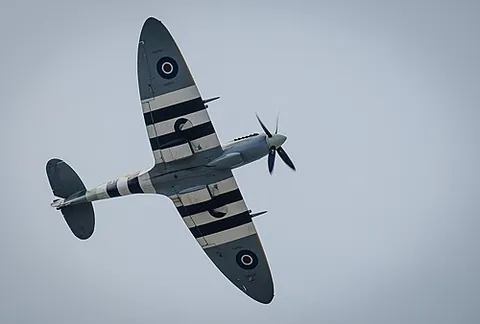 invasion stripes: a series of alternating black and white stripes painted on the fuselages and wings of Allied...