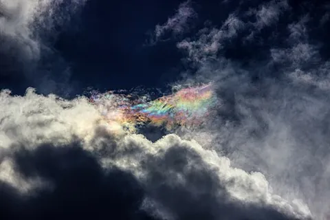 irisation: a colorful optical phenomenon seen in iridescent clouds and on the borders of lenticular clouds...