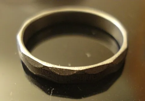 iron ring: the symbol of a Canadian engineer. A faceted stainless steel or iron ring worn on the little finger...