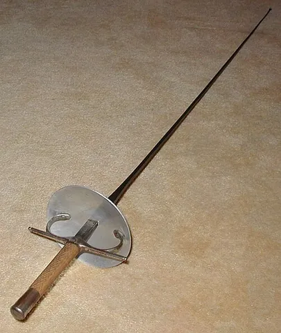 italian grip: a grip used for foil and épée that consists of a straight block of wood or aluminum wrapped in a...