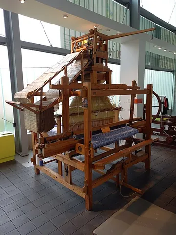 jacquard loom: a loom fitted with a Jacquard machine