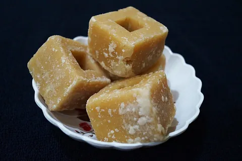 jaggery: a traditional dark-brown unrefined sugar made from palm tree sap which is used throughout South and...