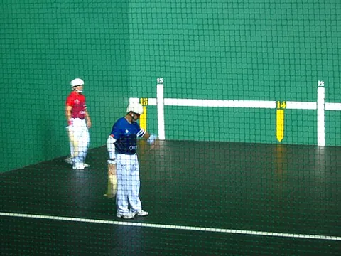 jai alai: a Basque ball game in which the players propel the ball using a long basket attached to the wrist