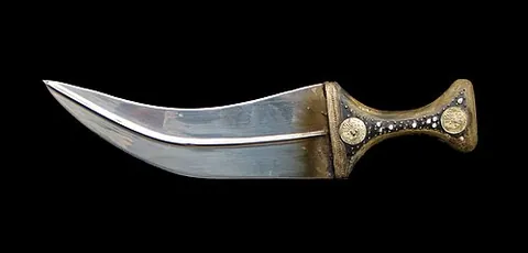 jambiya: an Arabian (especially Yemeni) dagger with a short curved blade that is worn on a belt