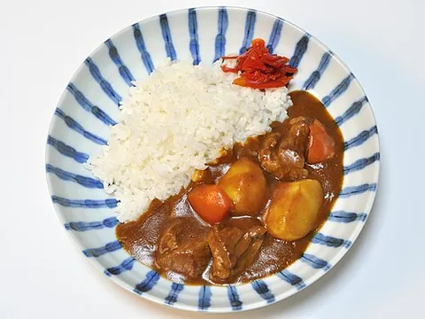 japanese curry: a dish based on a spiced sauce (usually relatively mild and sweet) thickened with roux, and often...