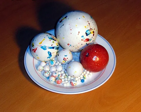jawbreaker: a large, extremely hard, boiled candy, typically spherical