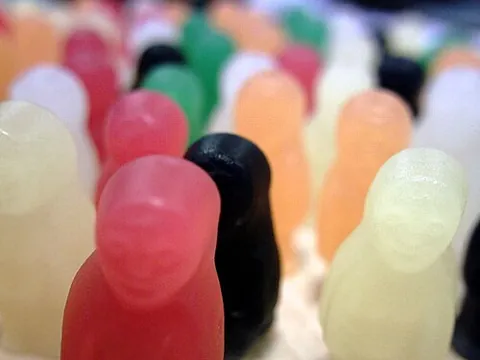 jelly baby: a piece of gelatine confectionery designed to approximate the shape of a human baby