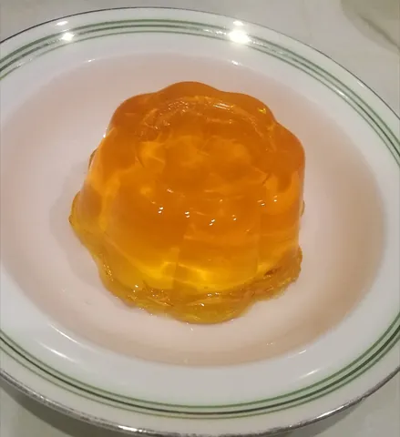 jelly: a dessert made by boiling gelatine (or a plant-based alternative such as agar or carrageenan),...