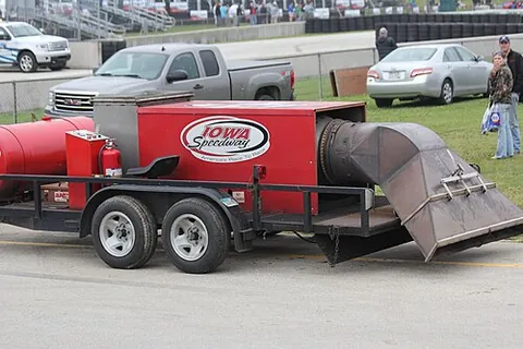 jet dryer: a piece of racetrack maintenance equipment, a truck or trailer equipped with a gas turbine jet...