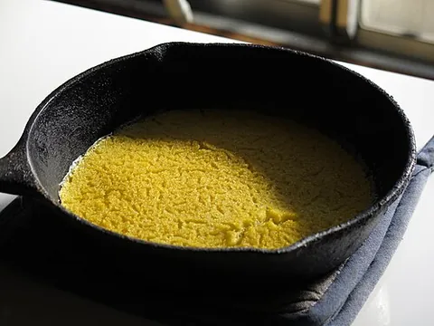 johnnycake: a dense, baked or fried flatbread made of cornmeal