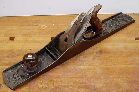 jointer plane: a plane used for final flattening out of wooden surfaces