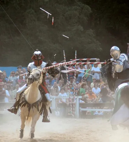 joust: a tilting match: a mock combat between two mounted knights or men-at-arms using lances in the lists...