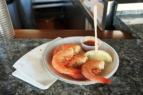 jumbo shrimp: a large size classification of the crustacean (shrimp); typically used in culinary contexts