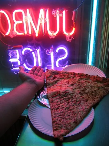 jumbo slice: an oversized New York-style pizza sold by the slice to go, especially popular in the Adams Morgan...