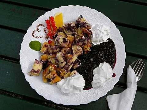 kaiserschmarrn: an Austrian dessert; a sweetened light shredded pancake filled with cream or fruit sauce, jam, and...