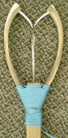 kakivak: a kind of fishing spear used by Inuits, with two recurved points, sometimes made from reindeer...