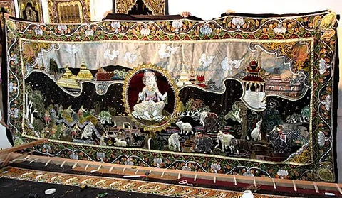 kalaga: an embroidered appliqué tapestry made of silk, flannel, felt, wool and lace, indigenous to Myanmar...