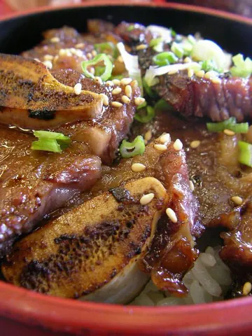 kalbi: a Korean barbecued rib dish, usually made from beef