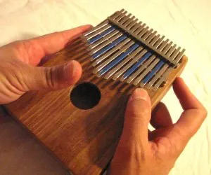 kalimba: a type of thumb piano, similar to the mbira