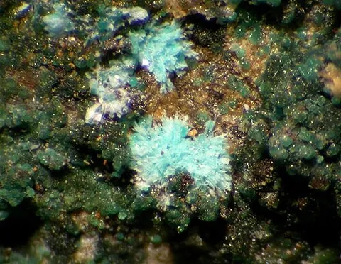kapellasite: a cyan, trigonal mineral found in Greece