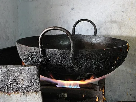 karahi: a deep circular vessel resembling a wok, traditionally of cast iron, used in South Asian cuisine