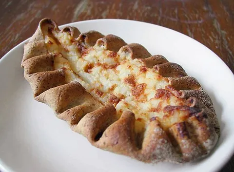 karelian pasty: a traditional pasty from Karelia, usually with a rye crust and now most often eaten with a mixture...