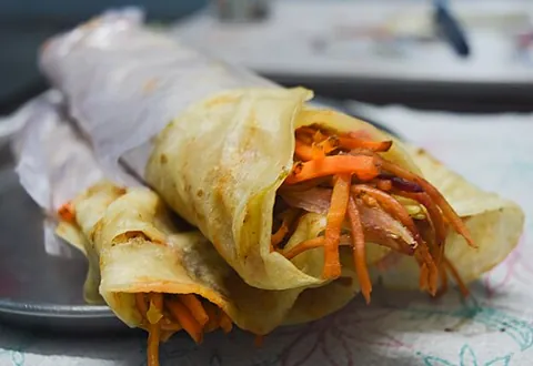 kati roll: a street-food dish from Kolkata, originally a skewer-roasted kebab wrapped in a paratha, but now...