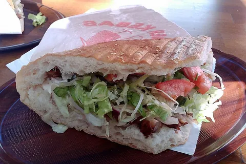kebab: a hand-held dish consisting of slices of meat or fish roasted on an upright skewer, usually mixed...