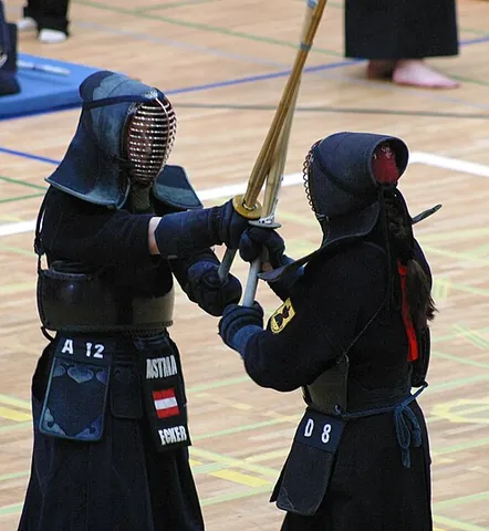 kendo: a Japanese martial art using "swords" of split bamboo