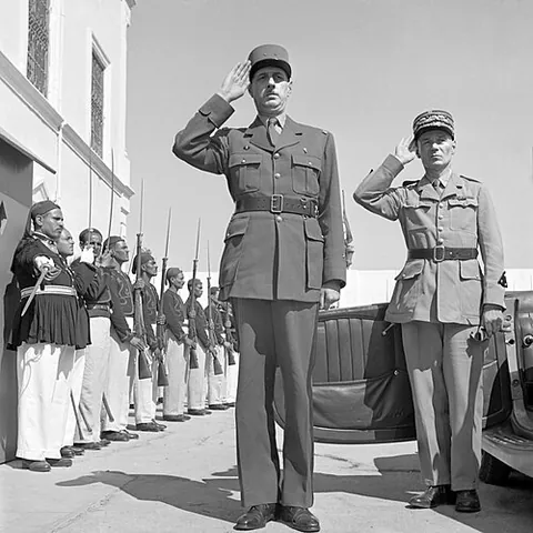 kepi: a cap with a flat circular top and a visor, particularly associated with French uniforms