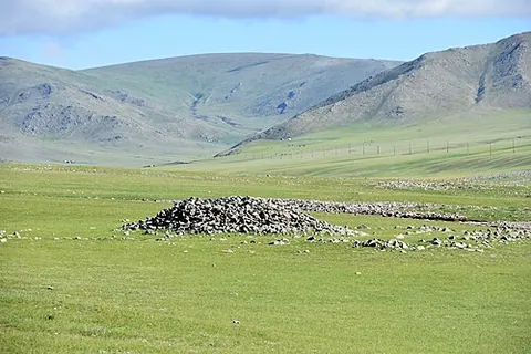khirigsuur: a kind of Bronze Age burial complex found in Mongolia, having a central stone mound with a stone...