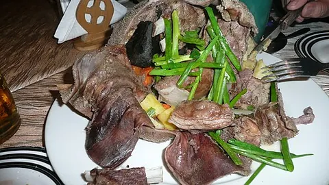 khorkhog: a Mongolian dish of meat cooked in a container with hot stones and water