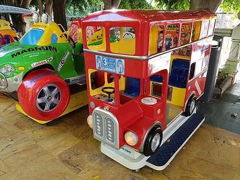kiddie ride: a small amusement ride for children, typically coin-operated