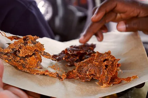 kilishi: a form of jerky from Hausaland, made from the dried meat of cows, sheep or goats, seasoned, coated...