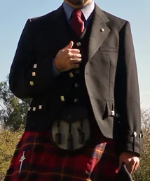 kilt jacket: a short fitted jacket with decorative (often tassled) buttons on pockets and sleeves