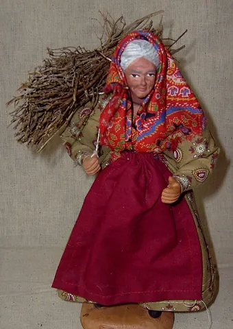 kitchen witch: a homemade doll in the form of a stereotypical witch or crone, displayed in home kitchens as a good...