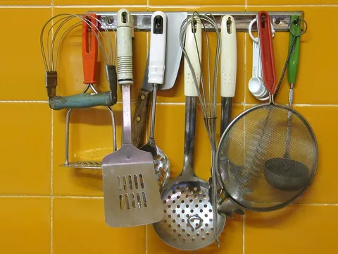 kitchenware: instruments and utensils found in a kitchen, particularly those associated with the preparation and...