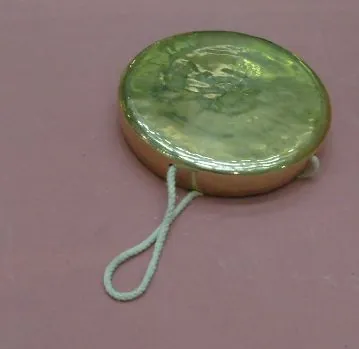 kkwaenggwari: a small brass gong used in Korean folk music