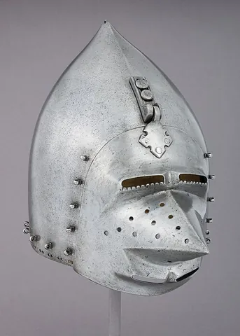 klappvisier: a type of visor, found on medieval European (especially German) helmets, typically hinged at a...