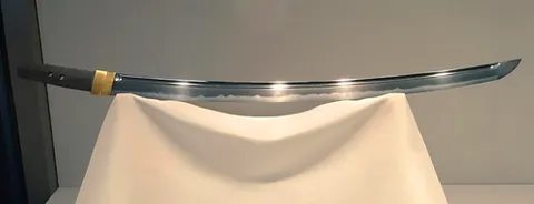 kodachi: a short Japanese sword, built like the katana but with a shorter blade