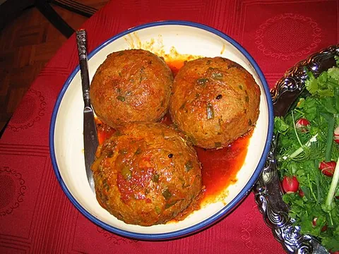 kofta: any of various spicy meatball or meatloaf dishes of the Middle East, Caucasus, South Asia, and the...