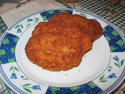 kotleta: a meat patty or meatball made of ground pork and/or beef flattened into an oval shape, then...