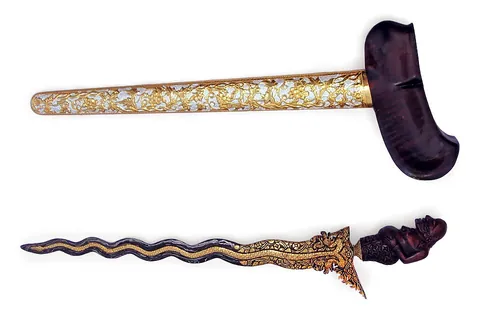kris: a traditional Indonesian, Malaysian, or Filipino sword or dagger having a tapering, usually...