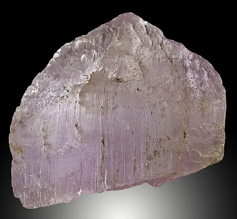 kunzite: a pink- to lilac-colored gemstone, a variety of spodumene