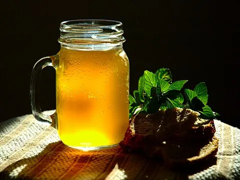 kvass: a fermented cereal-based low alcoholic beverage, often flavored with fruit, honey and herbs