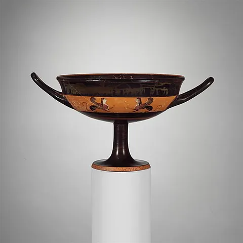 kylix: an Ancient Greek drinking cup with a stem, two handles, and a broad, shallow body