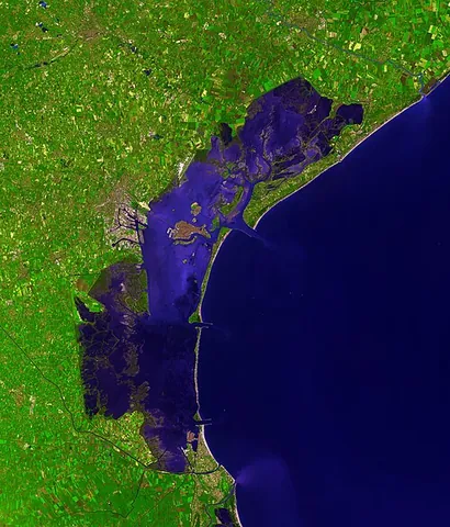 lagoon: a shallow body of water separated from deeper sea by a bar